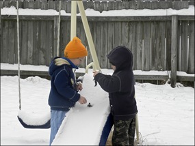 Snow or no snow - they play men on the slide.