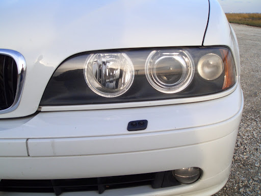 How to adjust headlights on 2000 ford mustang #1