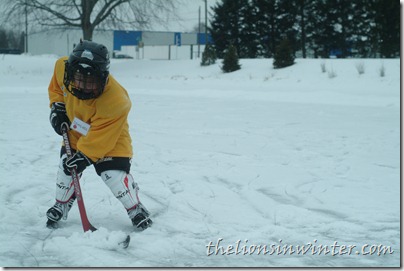 My boy playing hockey on the pond. Yes, it needed to be shoveled.