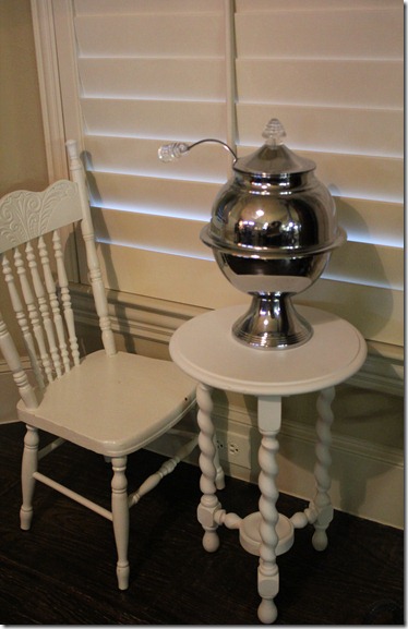 antique punch bowl on little table