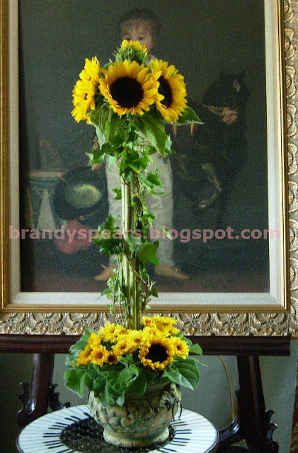 sunflower topiary wedding centerpiece