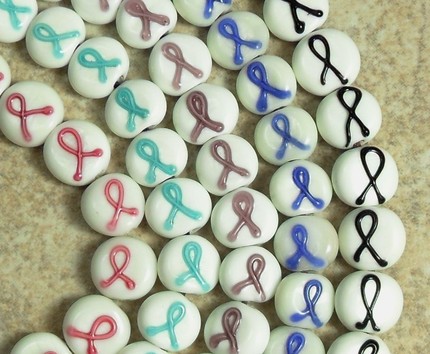 photo of White Beads with Colored Awareness Ribbons