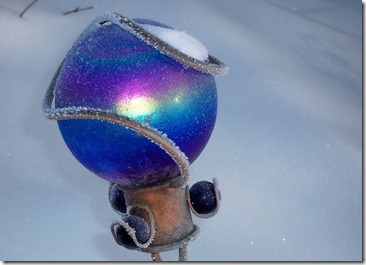 garden ball in snow