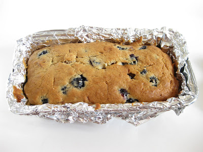 photo of a loaf of Blueberry banana bread in a pan