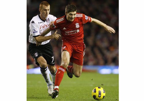 Steven Gerrard in action with Steven Sidwell, Liverpool - Fulham