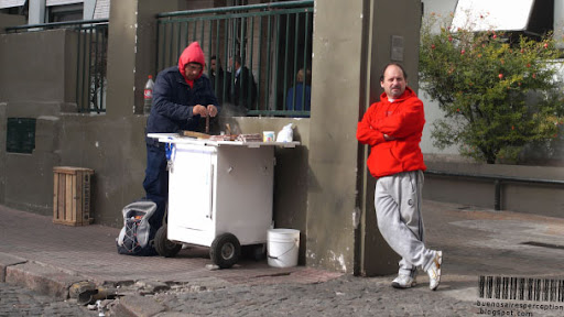 Two Guys at a Sweets Stand near Plaza Dorrego in the San Telmo Neighborhood in Buenos Aires, Argentina