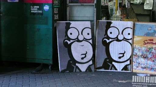 Best-Known All-American Figure: Homer Simpson Posters in front of a Kiosko in Buenos Aires, Argentina