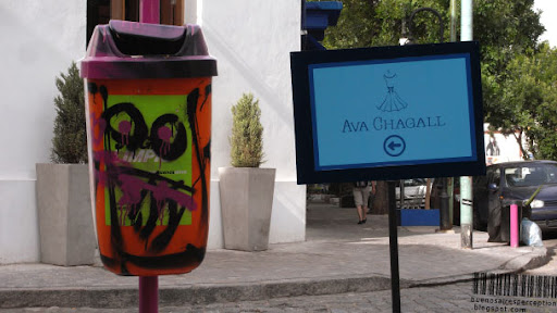 Trash Bin and Ava Chagall Signpost in Palermo Soho in Buenos Aires, Argentina