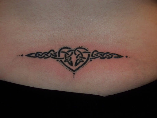 femininity Lower Back Tattoo