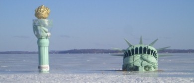 Statue of Liberty replica, seeming frozen in the ice of Lake Mendota