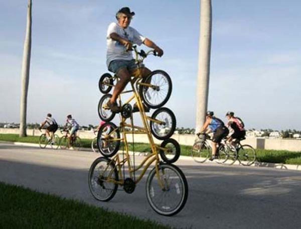 Photos of people doing stupid things - Man on four decker cycle