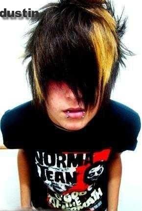 Emo boys hairstyles feature archetypal long bangs, brushed straight and in