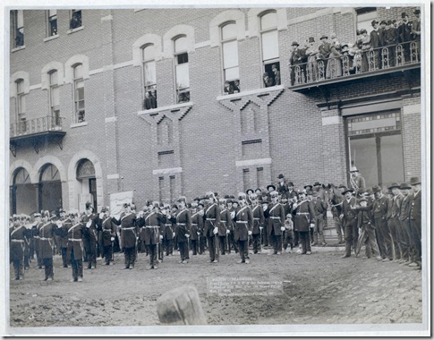 Title: Deadwood. Grand Lodge I.O.O.F. of the Dakotas, resting in front of City Hall after the Grand Parade, May 21, 1890
Group of uniformed men posing in front of a large brick building.
Repository: Library of Congress Prints and Photographs Division Washington, D.C. 20540