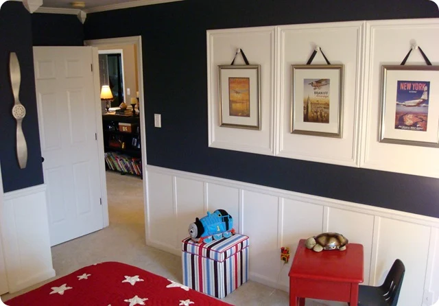 Navy blue walls white board and batten