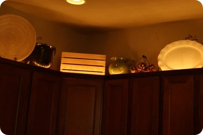 DIY lighting above cabinets