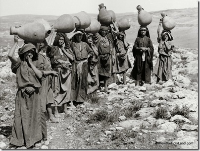 Women carrying water jars, mat00063