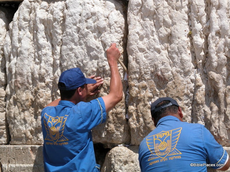 [Western Wall men cleaning out prayers6, tb090402880[3].jpg]