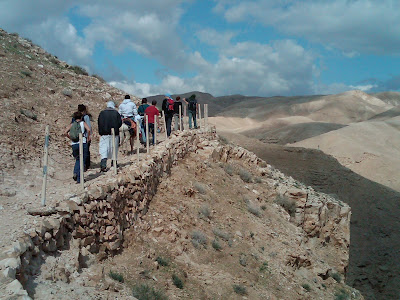 walking in the Wadi Quelt in the Palestinian Territories
