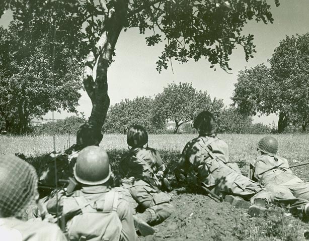Biazza ridge Sicily Invasion—U.S. paratroopers advancing through the Sicilian countryside after night landing. Gela, Sicily. Photos taken by the US Army Signal Corps during World War II