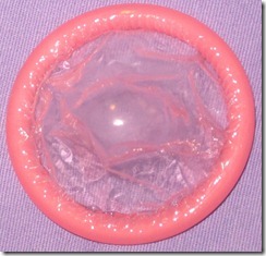Rolled_up_pink_condom
