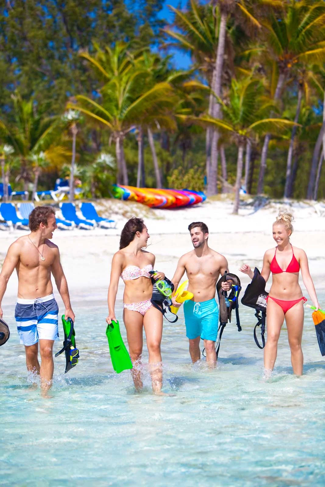 CocoCay-snorkeling-group - Grab your snorkeling gear and head out to the pristine waters off CocoCay in the Bahamas on a Royal Caribbean cruise. 