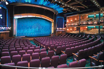 Watch entertainers, musical acts and Broadway-style performances in the theater aboard Adventure of the Seas.