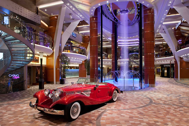 Walk along the Royal Promenade on Allure of the Seas and check out the replica of a classic Morgan Sportster before heading to one of several dining spots.