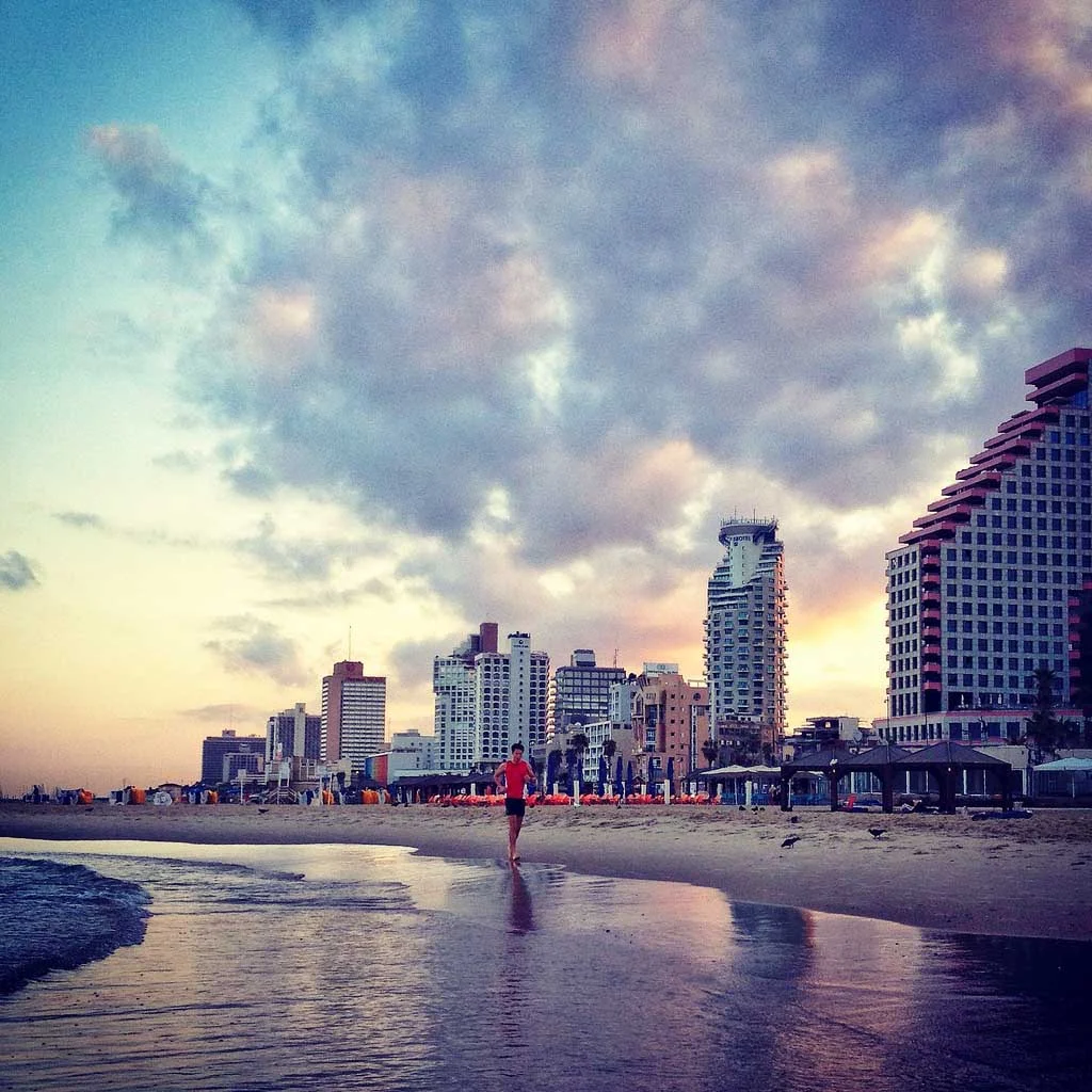 sunset-beach-hotels-Israel - Sunset on the beach in Tel Aviv, Israel.