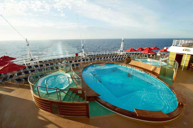 Take a morning swim in the Aft Pool on board Carnival Breeze.