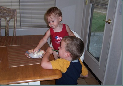 Evan and Caitlin eating cheescake