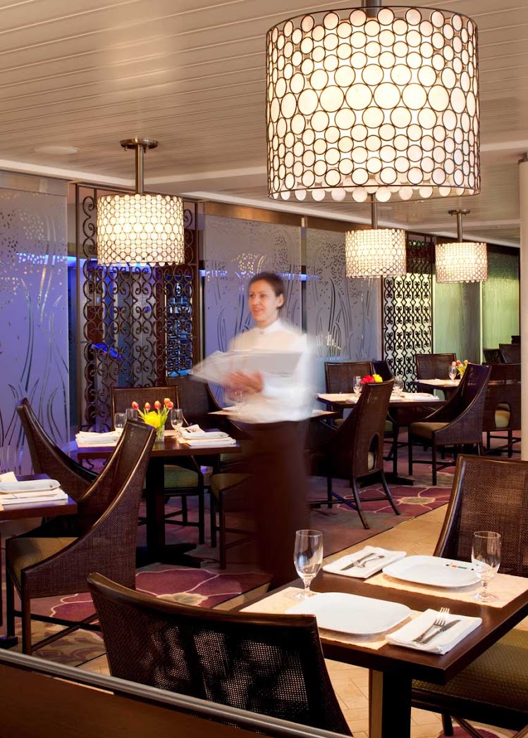 Enjoy the elegant dining experience in Celebrity Eclipse's Bistro Five dining room.