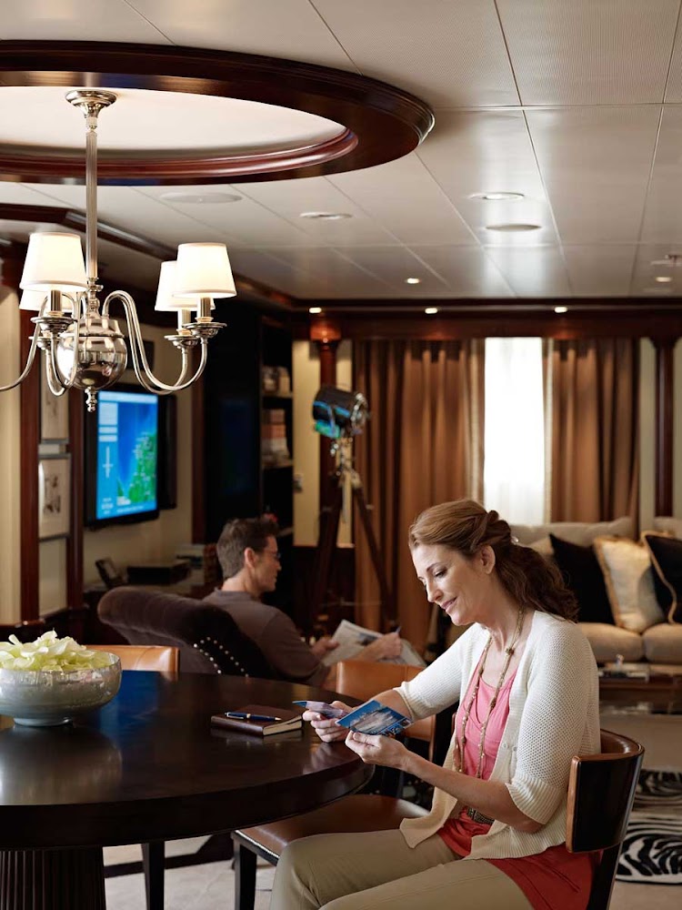 The living room in the Oceania Suite aboard Oceania Marina is designed with comfort and quietude in mind.