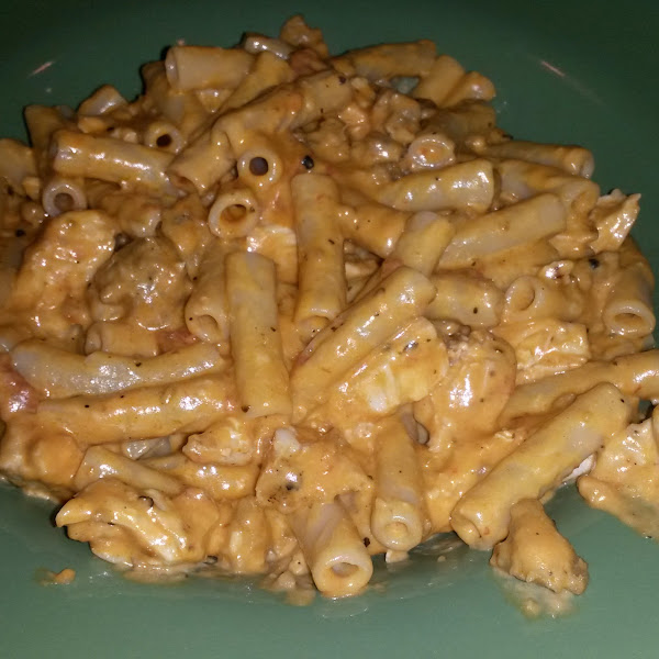 GF penne pasta with chicken and spicy Italian sausage in a tomato cream sauce.  very flavorful!