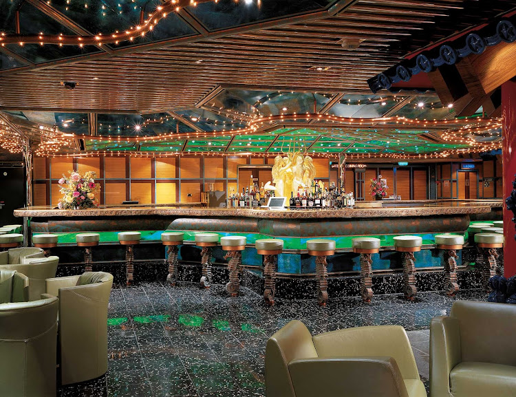 Take in a live performance at the Trident Bar, in Carnival Victory's casino. 