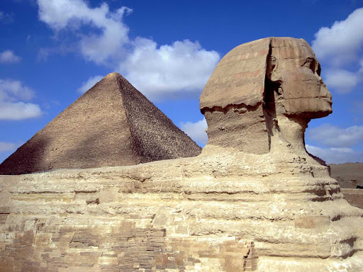 The Sphinx and the Great Pyramid of Khufu in Giza, Egypt.