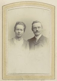 Portret van een vrouw en een man met een pince-nez