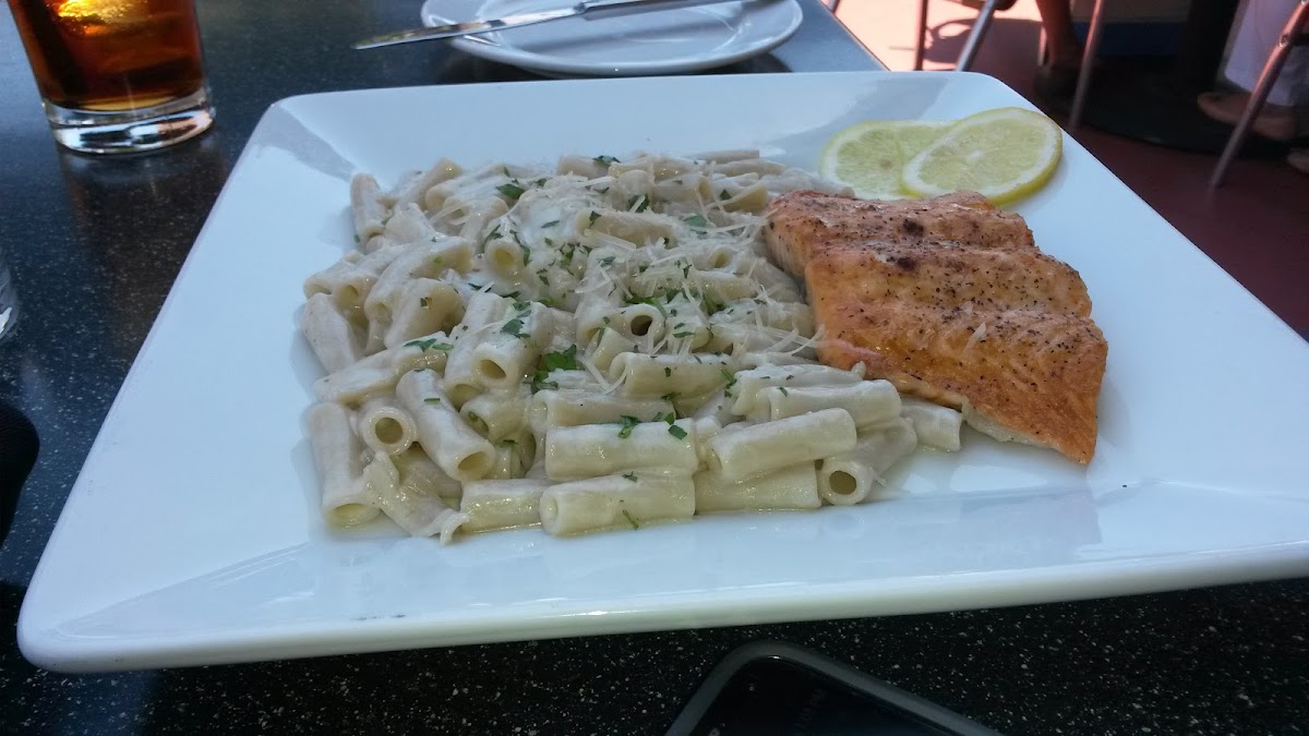 GF pasta in alfredo sauce and grilled salmon