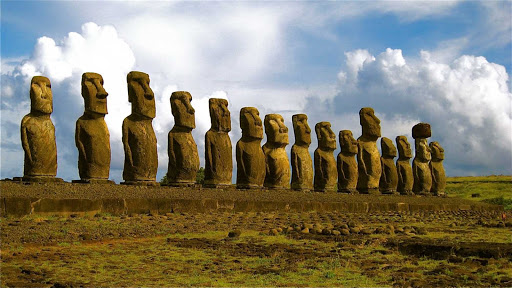 Statues at Ahu Tongariki, the largest ahu (stone platform) on Easter Island. It contains 15 moai (statues), including an 86-ton moai that was the heaviest ever built on the island.  