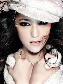 Chinese girl with sexy eyes and white hat 