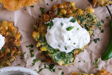 Spinach and Artichoke Corn Fritters with Brie and Sweet Honey Jalapeno Cream.