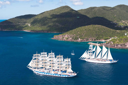 Royal Clipper, foreground, the largest and only five-masted full-rigged sailing ship built since 1902, sails alongside a sister ship.