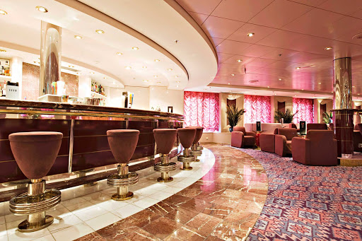 MSC-Lirica-Lirica-Lounge - Passengers aboard MSC Lirica can meet for a glass of wine or a cocktail in the Lirica Lounge before or after dinner. 