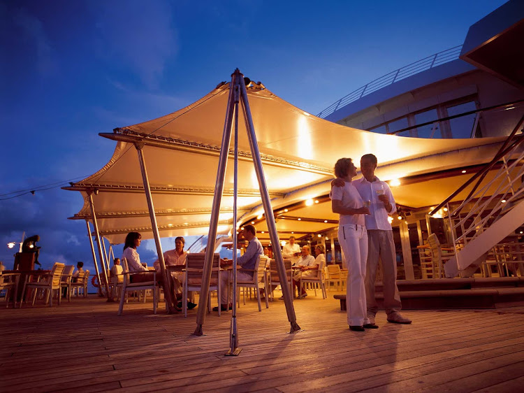 Have some drinks with your partner, or chat with some friends, under the moonlight on the Lido Deck of Europa 2.