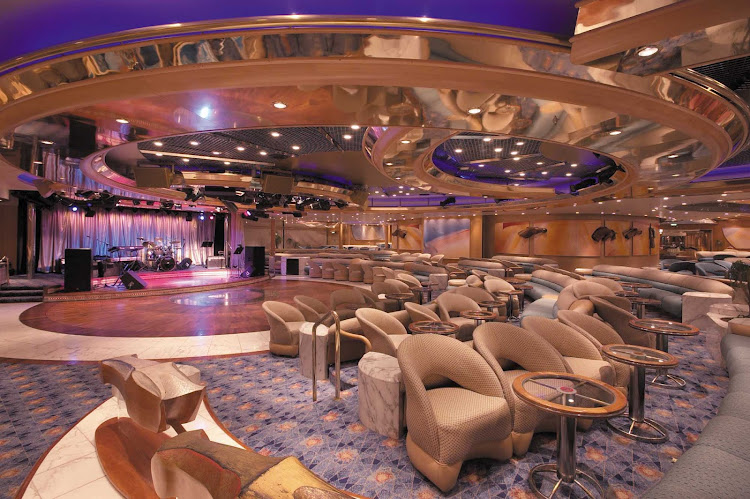 Meet friends for an evening of dancing, live music and cabaret at the Carousel Lounge, on deck 6 of Enchantment of the Seas.