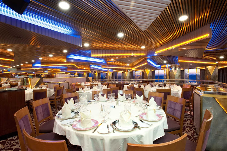 The Pride dining room, one of Carnival Imagination's two main dining halls, serves fine food and wines.
