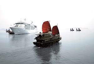 In Ha Long Bay, Vietnam, Silver Cloud passes an eye-popping junk. Junk ships were used as ocean-going vessels from as early as the 2nd century AD.