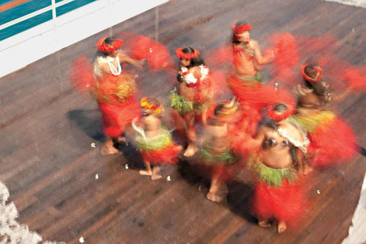 Shows by local performers bring a taste of true Polynesian style to the pool deck of the Paul Gauguin.