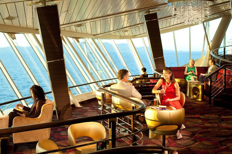 In the evening, the Viking Crown Lounge, at the top of Grandeur of the Seas, transforms from a quiet observation point to a lively adults-only nightclub.