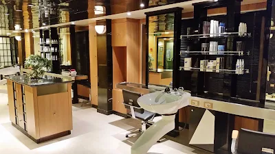 The hair salon, located in the Lotus Spa, deck 16 forward on Emerald Princess.