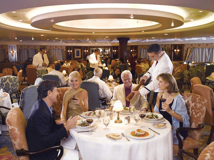 Dine in the European elegance of the Grand Dining Room during your travels on Oceania Nautica.